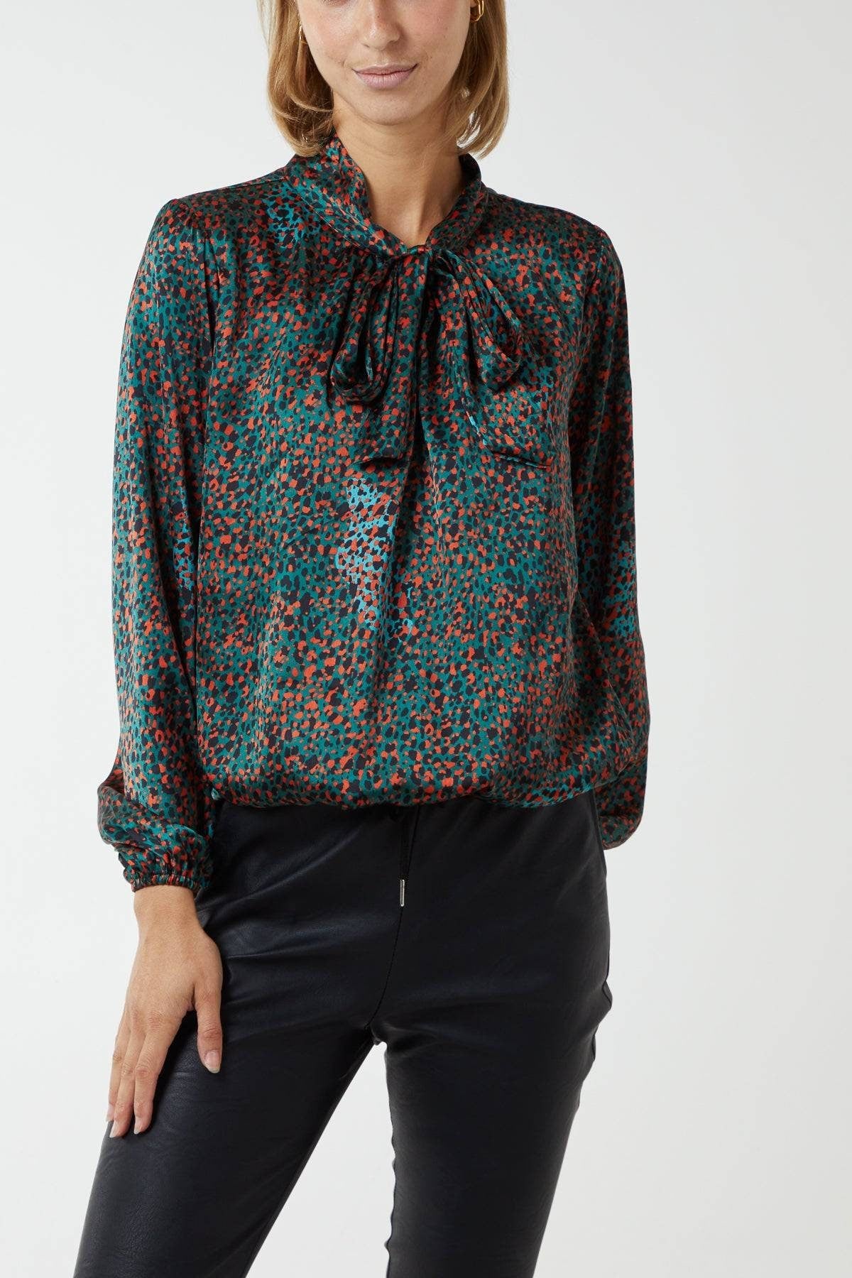 Orange, teal and black pussybow blouse