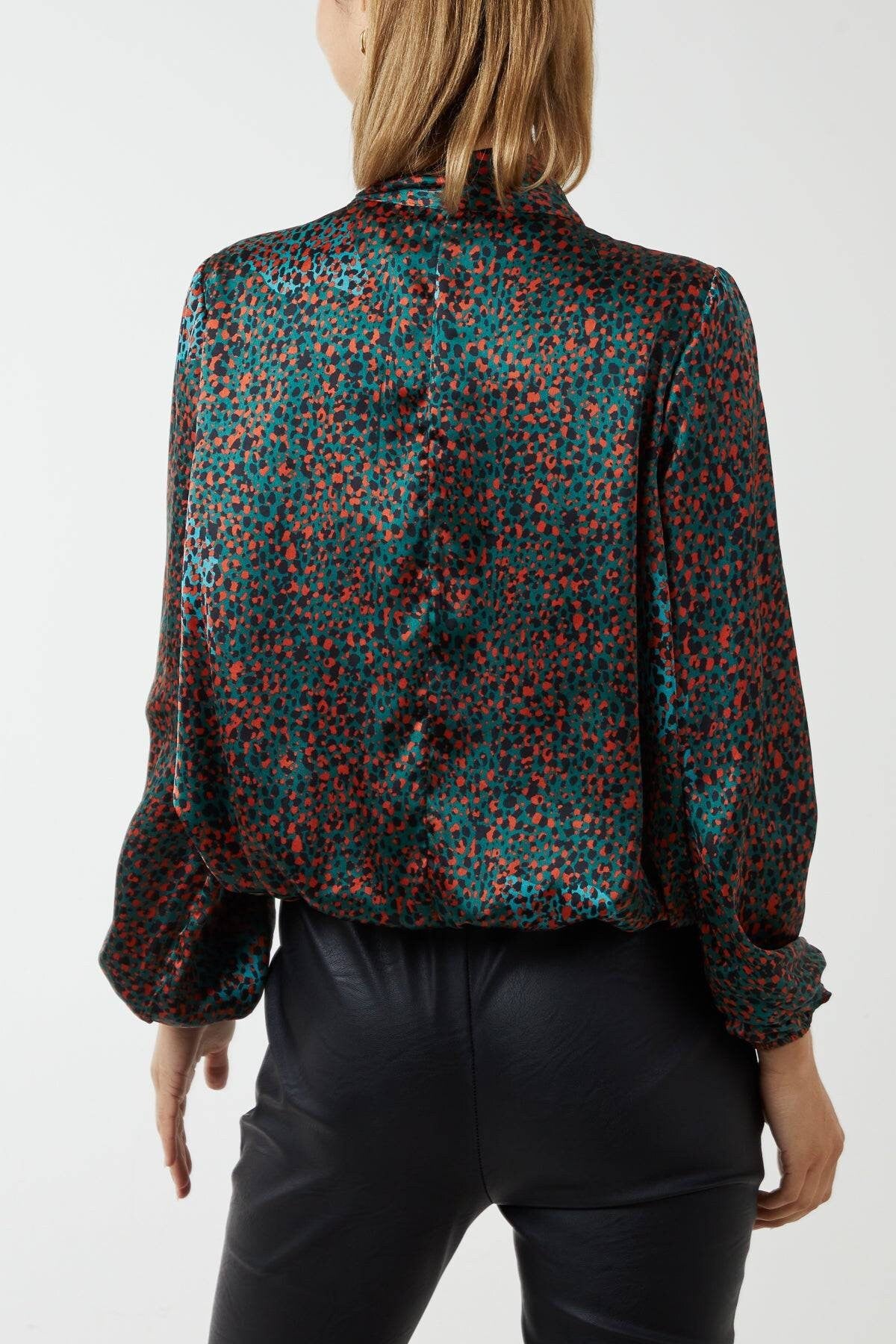 Orange, teal and black pussybow blouse